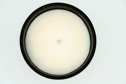 Juju's Candles black jar, top-down open view