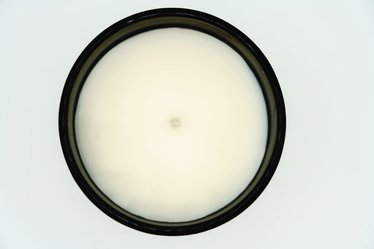 Juju's Candles black jar, top-down open view